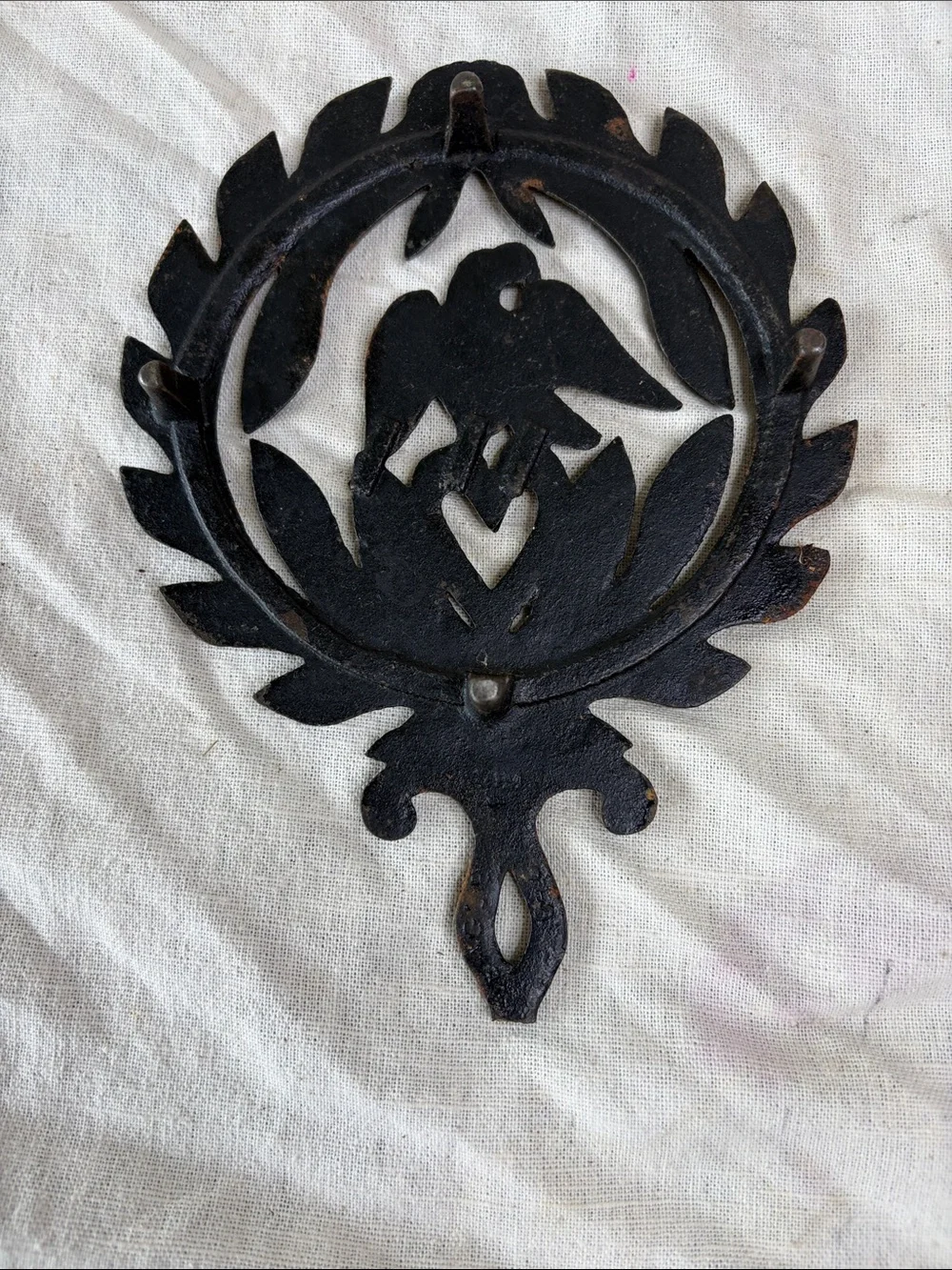 Rustic Black Cast Iron Wall Decor with Dove and Heart Motif